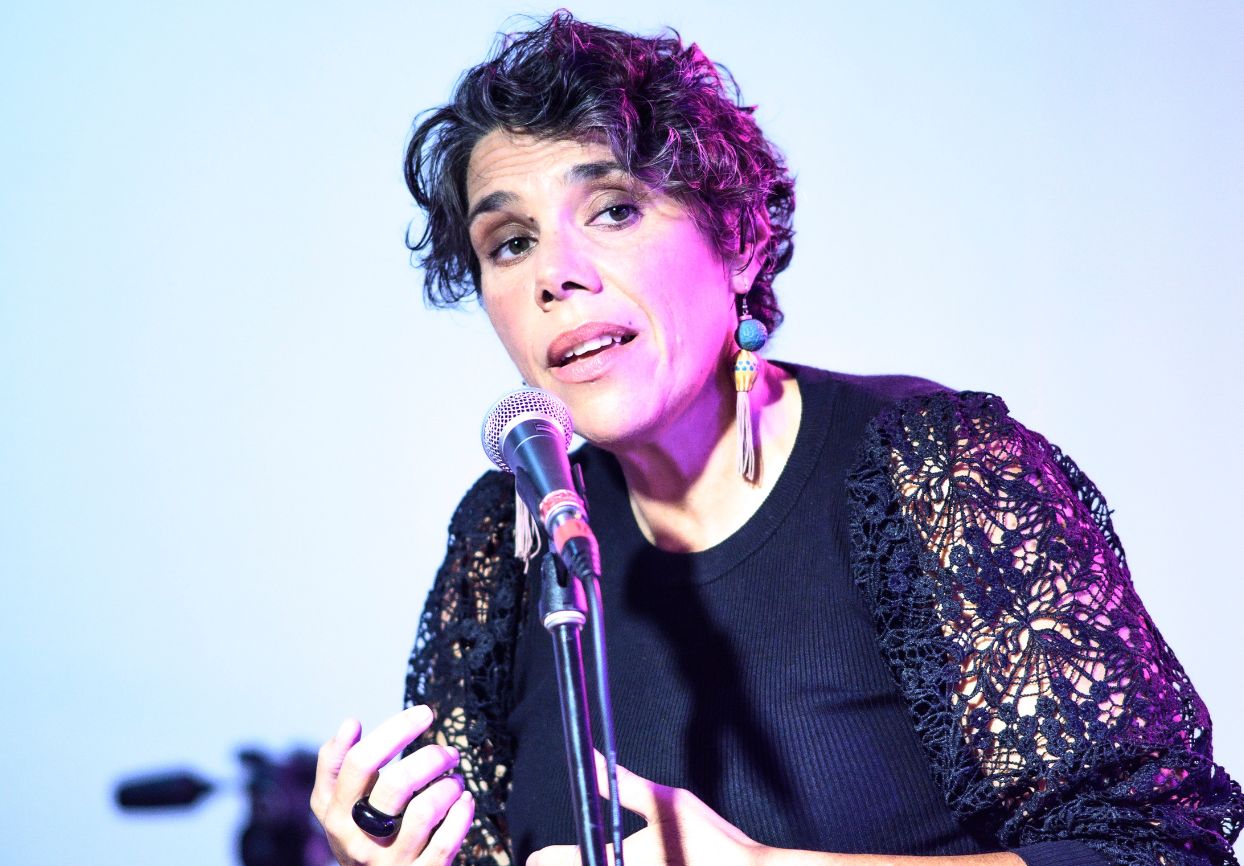 Nardi Simpson at a microphone