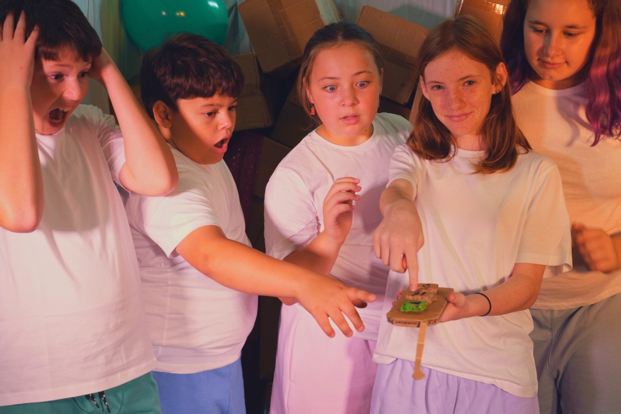 Kids acting out a scene as part of Press Play